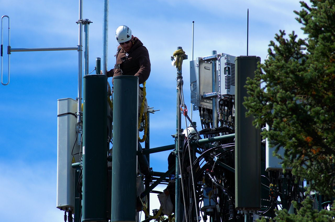 Image of Man Working on Cell Tower